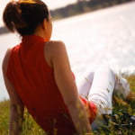 Woman Sitting on Grass